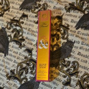 Too Faced Rich Dazzling Lip Gloss in Social Butterfly